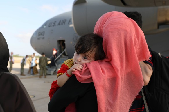 STYLELOCATIONAfghan families evacuated from Kabul arrive at Naval Air Station Rota August 27, 2021 in Rota, Spain. NAS Rota is providing temporary lodging for evacuees from Afghanistan as part of Oper ...