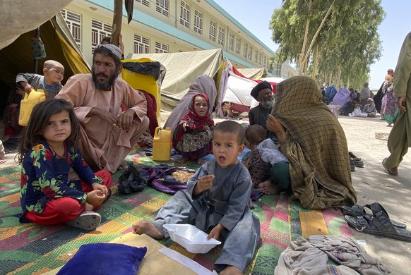 Internally displaced Afghans who fled their home due to fighting between the Taliban and Afghan security personnel, are seen at a camp in Daman district of Kandahar province south of Kabul, Afghanista ...