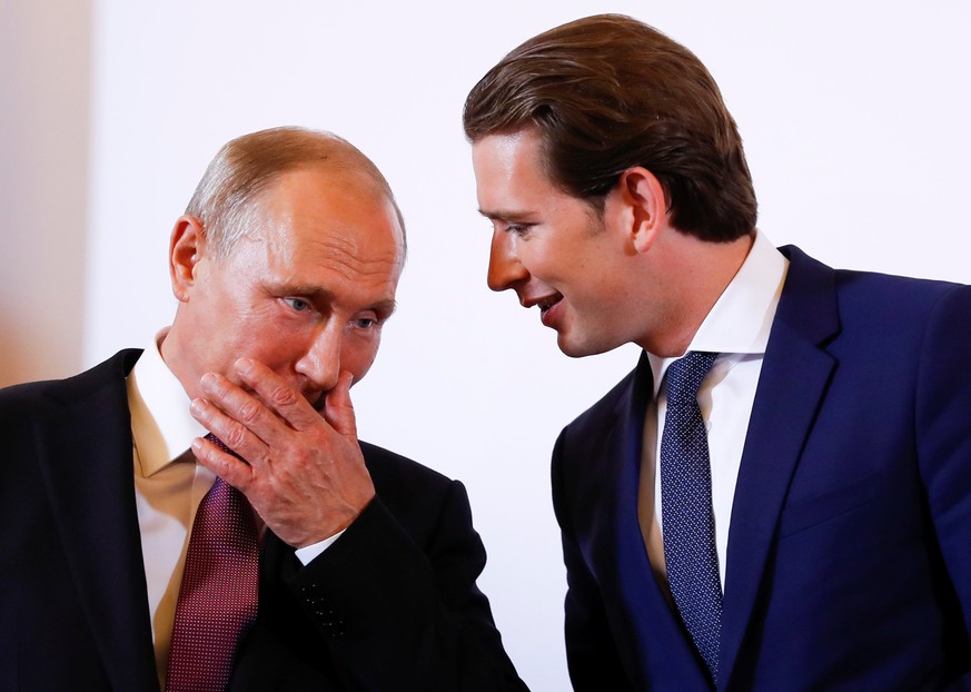 Austria&#039;s Chancellor Sebastian Kurz and Russia&#039;s President Vladimir Putin attend a news conference in Vienna, Austria June 5, 2018. REUTERS/Leonhard Foeger