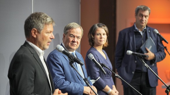 Armin Laschet, CDU-Bundesvorsitzender und Ministerpräsident von Nordrhein-Westfalen, Annalena Baerbock, Bundesvorsitzende von Bündnis 90/Die Grünen, Robert Habeck, Bundesvorsitzender von Bündnis 90/Di ...