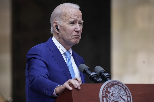 President Joe Biden listens during a news conference with Mexican President Andres Manuel Lopez Obrador and Canadian Prime Minister Justin Trudeau at the 10th North American Leaders' Summit at the Nat ...