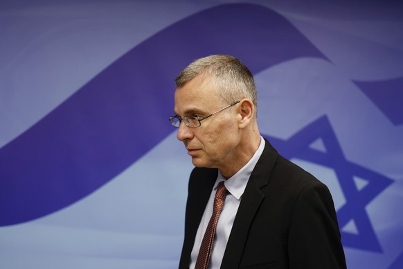 Israeli Justice Minister Yariv Levin arrives to attend a cabinet meeting at the prime minister&#039;s office in Jerusalem, Sunday, Aug. 20, 2023. (Amir Cohen/Pool Photo via AP)