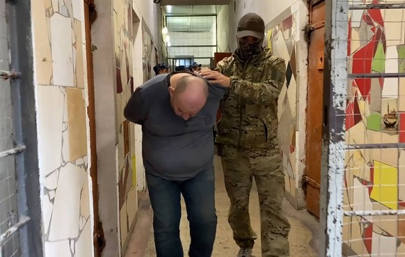 RUSSIA, KHERSON REGION - NOVEMBER 8, 2022: Pictured in this video screen grab is an operation to detain members of the Security Service of Ukraine s sabotage and reconnaissance team who have been plot ...