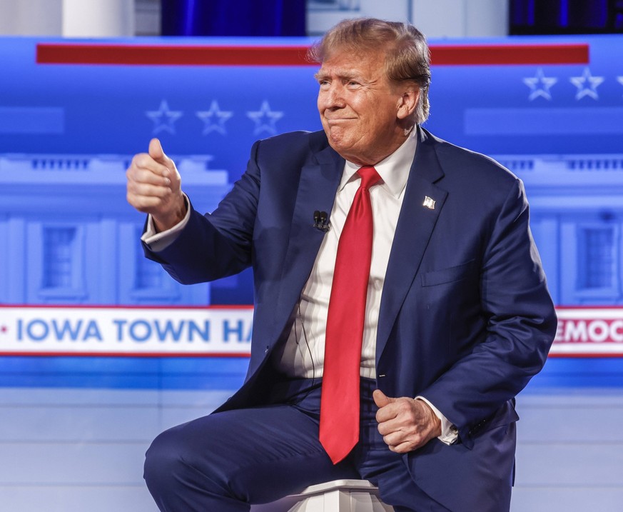 Former US President Donald J. Trump participates in a Fox News Town Hall event at the Iowa Events Center in Des Moines, Iowa, January 10, 2024. Trump and other Republican candidates are appealing to I ...