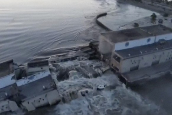 This image made from video provided by Ukraine's Presidential Office shows the damaged Kakhovka dam near Kherson, Ukraine, Tuesday, June 6, 2023. Ukraine on Tuesday accused Russian forces of blow ...