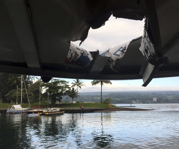 This photo provided by the Hawaii Department of Land and Natural Resources shows damage to the roof of a tour boat after an explosion sent lava flying through the roof off the Big Island of Hawaii Mon ...