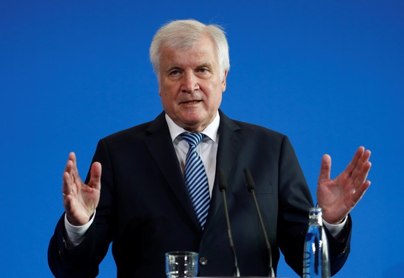 German Interior Minister Horst Seehofer addresses a news conference a in Berlin, Germany, September 19, 2018. REUTERS/Fabrizio Bensch