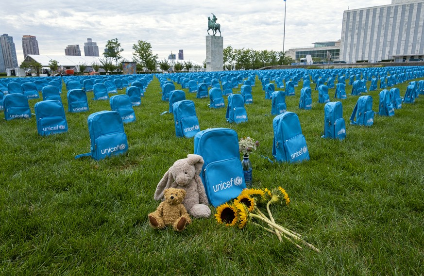 Thousands of school backpacks are laid out in an installation on the North Lawn of the United Nations Sunday, Sept. 8, 2019. The installation, created by UNICEF, illustrates the scale of child deaths  ...