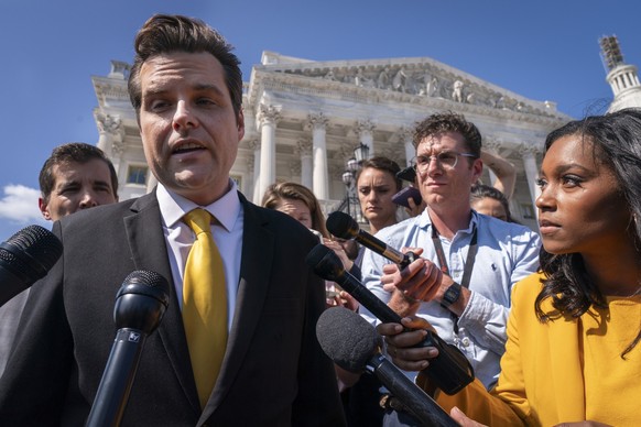 Rep. Matt Gaetz, R-Fla., left, one of House Speaker Kevin McCarthy&#039;s harshest critics, answers questions from members of the media after speaking on the House floor, at the Capitol in Washington, ...