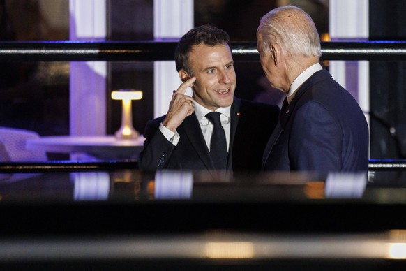 November 30, 2022, Washington, District of Columbia, USA: United States President Joe Biden and French President Emmanuel Macron depart after dining at the restaurant Fiola Mare, in Washington, DC, US ...
