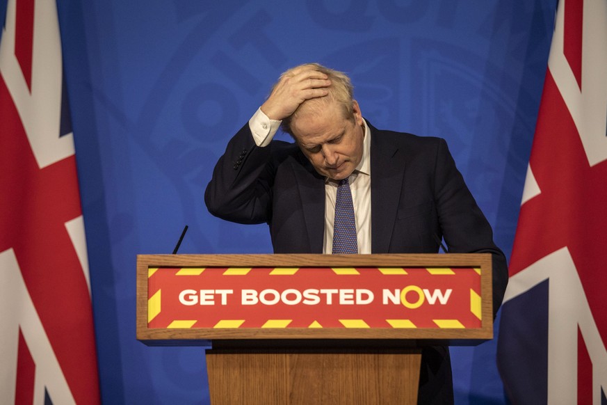 Britain&#039;s Prime Minister Boris Johnson gestures during a coronavirus media briefing in Downing Street, London, Tuesday, Jan. 4, 2022. Johnson sees no need for further restrictions to curb the spr ...