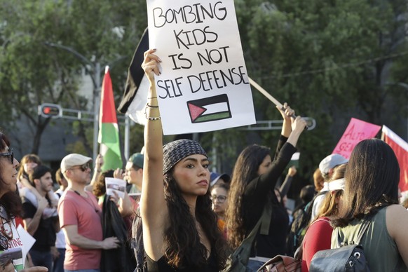 People march against the latest Israeli-Hamas war and in support of the Palestinians in Gaza, in Mexico City, Sunday, Nov. 5, 2023. (AP Photo/Ginnette Riquelme)