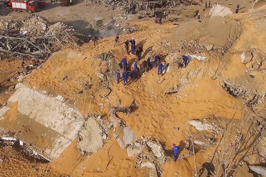 BEIRUT, LEBANON - AUGUST 7, 2020: Pictured in this video screen grab are workers of Emercom Russian Emergency Situations Ministry continuing search and rescue efforts among the ruins of a grain elevat ...