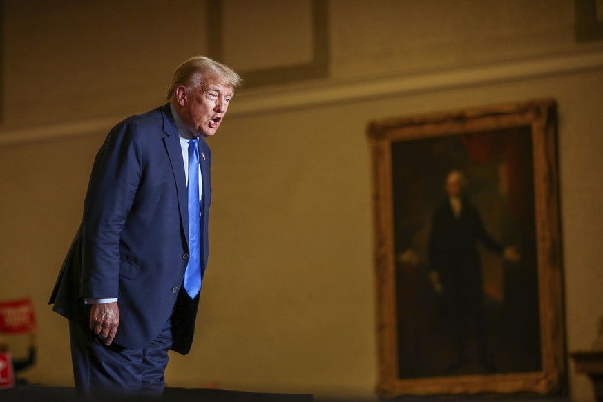 Former President Donald Trump greets the crowd at a campaign rally Saturday, Nov. 11, 2023, in Claremont, N.H. (AP Photo/Reba Saldanha)