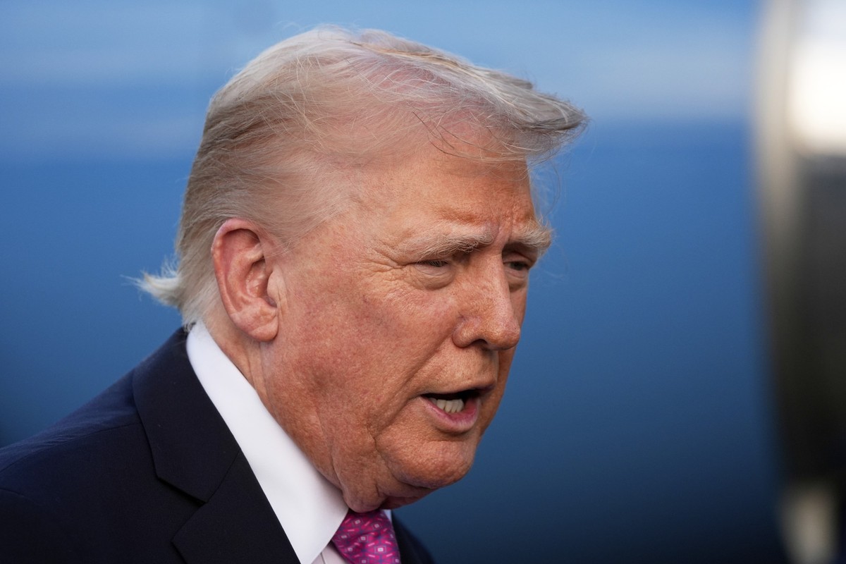 President Donald Trump speaks with reporters before boarding Air Force One at Morristown Airport, Sunday, Sept. 14, 2025, in Morristown, N.J. (AP Photo/Alex Brandon)