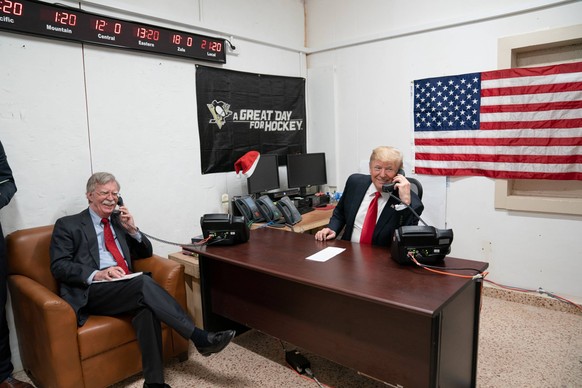 December 26, 2018 - Washington, Iraq - President Donald J. Trump, joined by National Security Advisor John Bolton, speaks on the phone with Iraq Prime Minister Adil Abdul-Mahdi Wednesday, December 26, ...