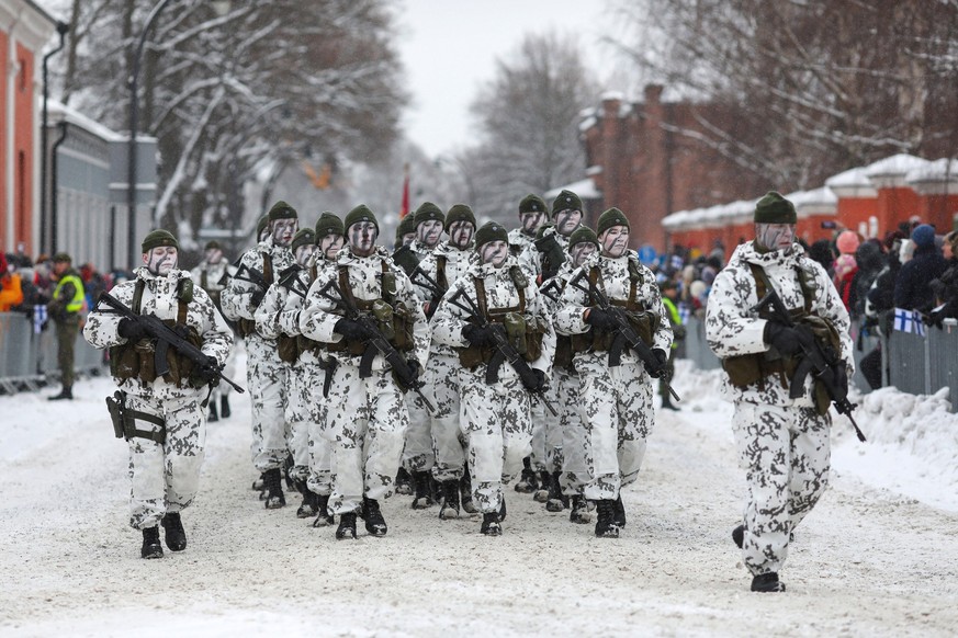 December 6, 2022, Hamina, Finland: Soldiers of the Finnish Armed Forces march during the Independence Day parade in Hamina city The Finnish Defence Forces celebrated the 105th Independence Day of Finl ...