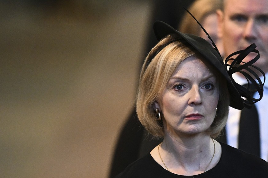 Britain&#039;s Prime Minister Liz Truss leaves after a service for the reception of Queen Elizabeth II&#039;s coffin at Westminster Hall, in London, Sept. 14, 2022. The Queen will lie in state in West ...
