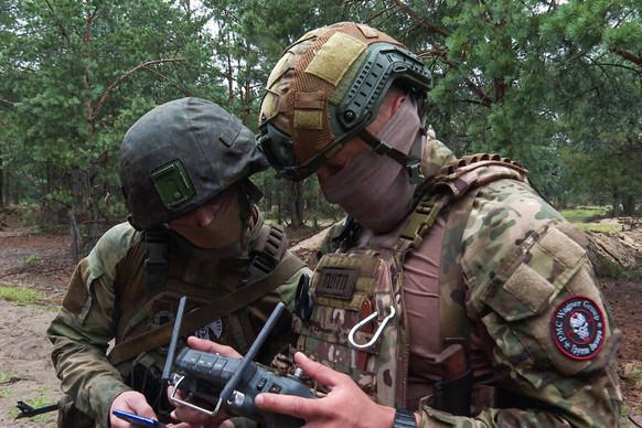 BELARUS - JULY 20, 2023: A joint combat training of Armed Forces of Belarus servicemen and PMC Wagner fighters at the Brestsky training ground. During the sessions, the focus is on organizing cooperat ...