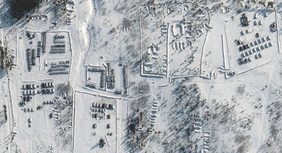 This satellite images provided by Maxar Technologies shows troops gathered at a training ground in Pogonovo, Russia, on Jan. 26, 2022. (Maxar Technologies via AP)