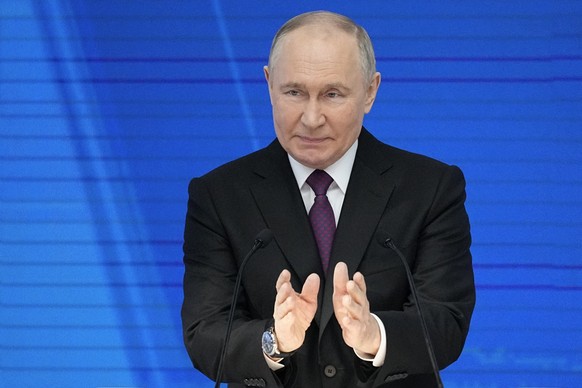 Russian President Vladimir Putin gestures as he delivers his state-of-the-nation address in Moscow, Russia, Thursday, Feb. 29, 2024. (AP Photo/Alexander Zemlianichenko)