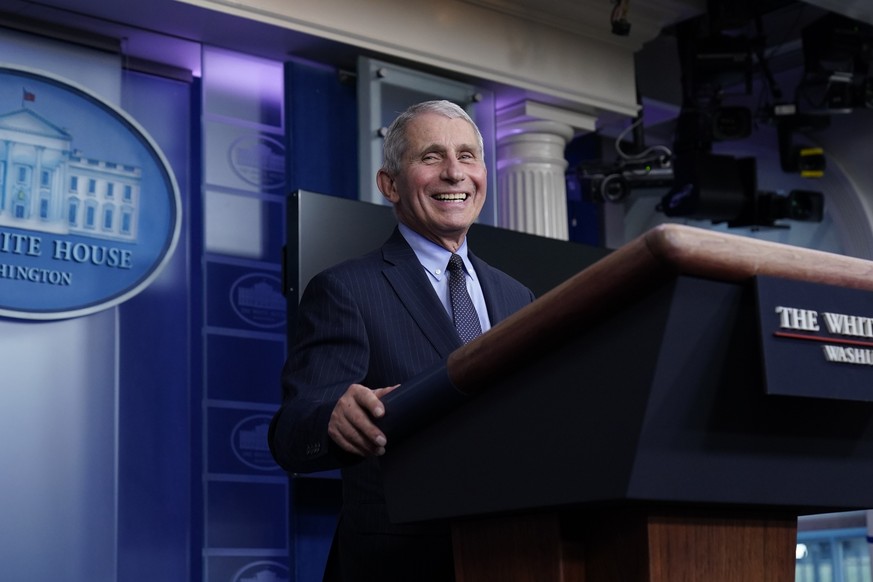 Dr. Anthony Fauci, director of the National Institute of Allergy and Infectious Diseases, laughs while speaking in the James Brady Press Briefing Room at the White House, Thursday, Jan. 21, 2021, in W ...