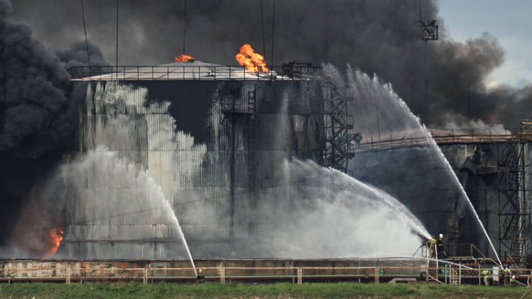 RUSSIA, SEVASTOPOL - APRIL 29, 2023: Firefighters battle a fire at an oil depot in Sevastopol s Kazachya Bukhta neighborhood. According to preliminary data, a fuel tank has caught fire after a drone a ...