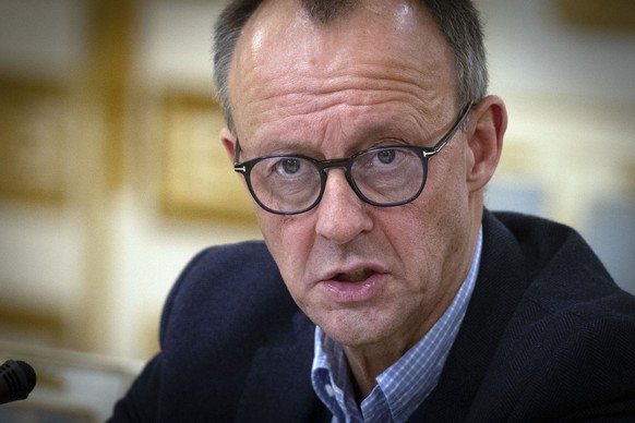 The Chairman of the German Christian Democratic Party (CDU) Friedrich Merz talks during his meeting with Ukrainian President Volodymyr Zelenskyy in Kyiv, Ukraine, Monday, Dec. 9, 2024. (AP Photo/Efrem ...