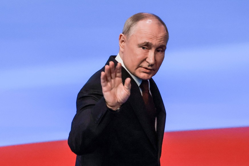 RUSSIA, MOSCOW - MARCH 18, 2024: Presidential candidate, incumbent president Vladimir Putin speaks at his election campaign office in Gostiny Dvor. The 2024 Russian presidential election is scheduled  ...