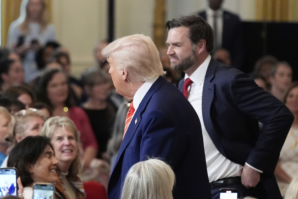 President Donald Trump, left, and Vice President JD Vance depart an event for Military Mothers, in the East Room of the White House, Thursday, May 8, 2025, in Washington. (AP Photo/Alex Brandon)