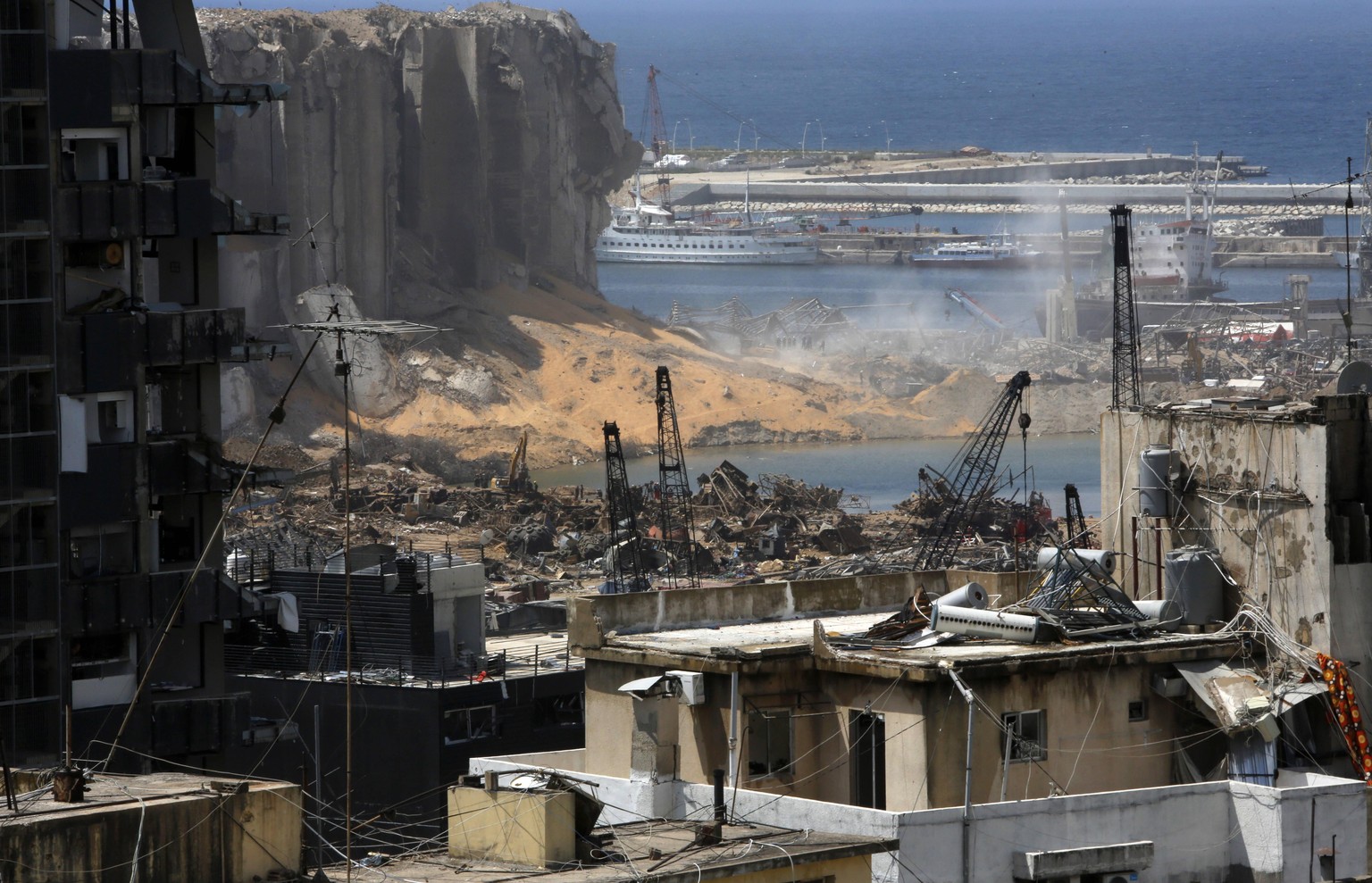 August 9, 2020, Beirut, Beirut, Lebanon: A picture shows damaged buildings in the aftermath of a colossal explosion that occurred days prior due to a huge pile of ammonium nitrate that had languished  ...