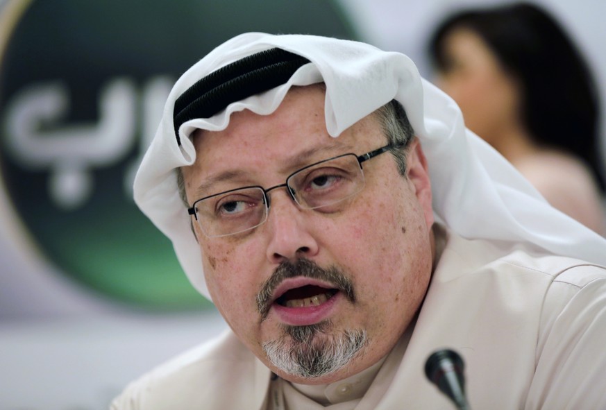 FILE - In this Dec. 15, 2014, file photo, Saudi journalist Jamal Khashoggi speaks during a press conference in Manama, Bahrain. Nearly one year has passed since the Oct. 2 killing of Khashoggi, whose  ...