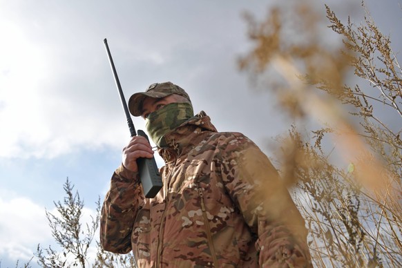 Russia Ukraine Military Operation Troops 8539379 17.10.2023 A serviceman of Russian Signal corps uses an Azart radio station in the course of Russia s military operation in Ukraine, at the unknown loc ...