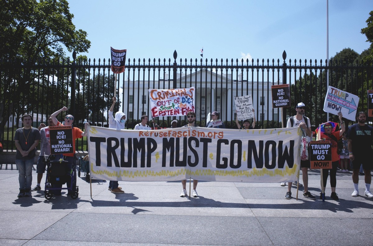 U.S. President Donald Trump Holds A Press Conference At The White House On August. 11, 2025 People protest President Trump outside the gates of the White House in Washington, D.C., on August 11, 2025. ...