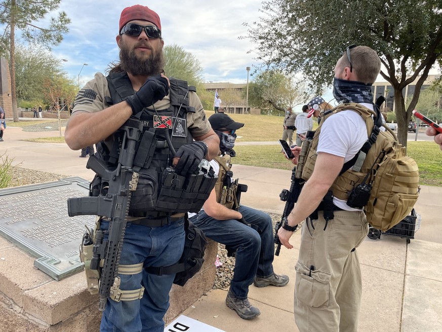 Maga at az capitol 1184, Phoenix, Ariz., USA - Jan 6, 2021: Mostly maskless Trump supporters upset about election results rally at the State Capitol on the same day others storm the US Capitol in DC