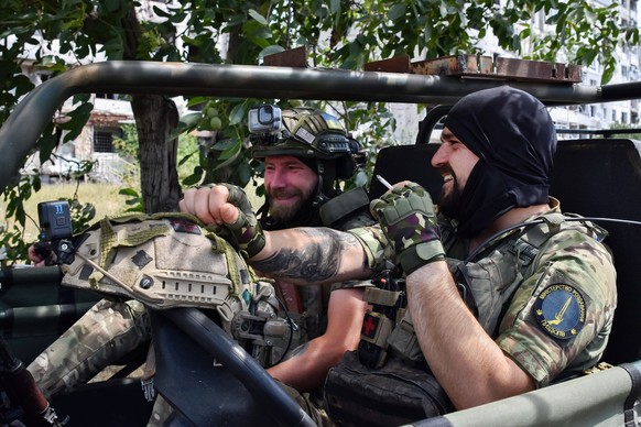 July 10, 2024, Orikhiv, Zaporizhzhia, Ukraine: Ukrainian soldiers from the evacuation team of 65th Separate Mechanized brigade smoke in the evacuation buggy in Orikhiv. Ukrainian defenders use beach b ...