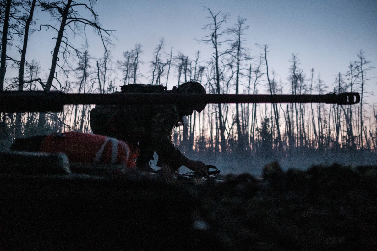Military mobility of Ukrainian soldiers in Luhansk LUHANSK REGION, UKRAINE - JUNE 19: 1st brigade of National Guard Bureviy , carry out a mission in a BMP-2 to shoot at russian positions in Serebryans ...