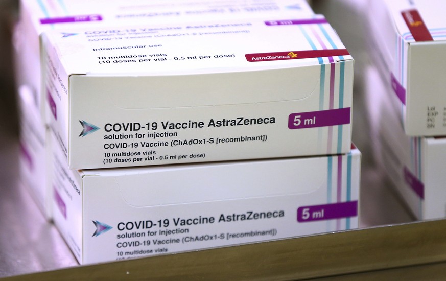 FILE - In this Jan. 2, 2021, file photo, doses of the COVID-19 vaccine developed by Oxford University and U.K.-based drugmaker AstraZeneca arrive at the Princess Royal Hospital in Haywards Heath, Engl ...