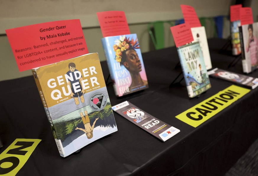 September 26, 2022: A selection of banned and challenged books are seen on a table as members of City Lit Theater Company read excerpts from them during Banned Books Week 2022, at the Lincoln Belmont  ...