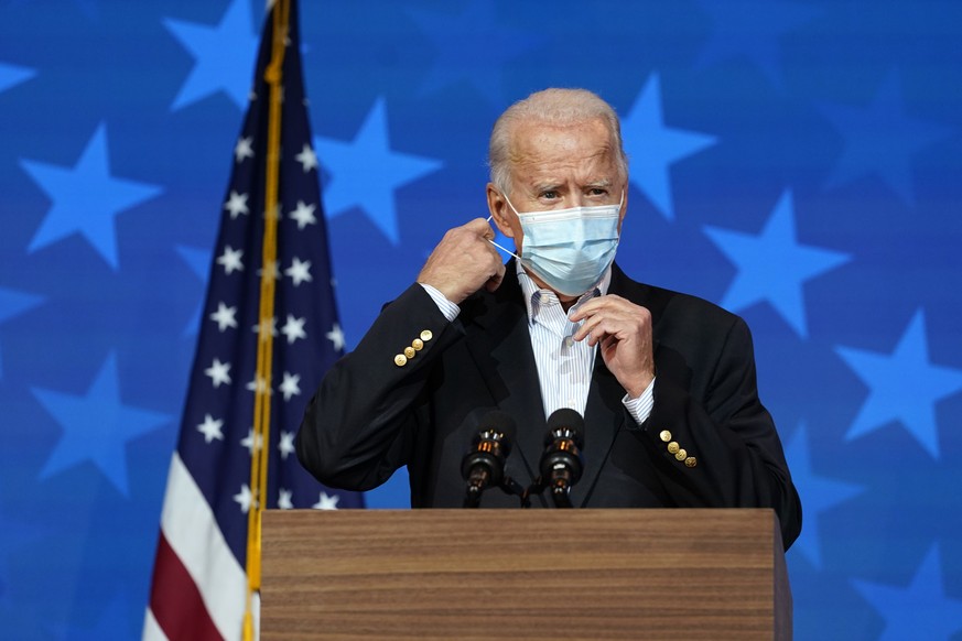 Der gewählte US-Präsident Biden trägt im Gegensatz zu Donald Trump Maske.