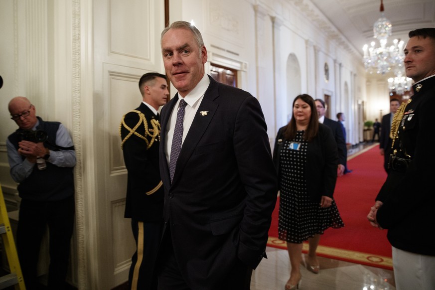 FILE - In this Oct. 24, 2018, file photo, U.S. Secretary of the Interior Ryan Zinke arrives for an event in the East Room of the White House in Washington. Zinke unleashed a scathing personal attack o ...