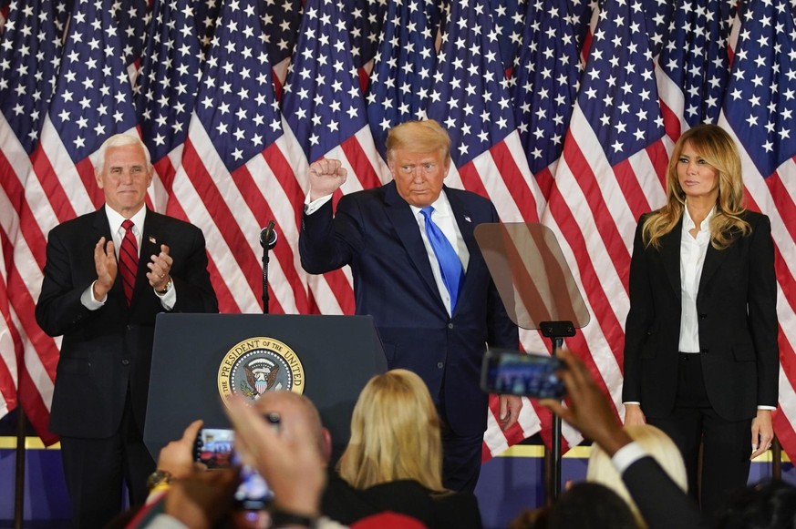 FILE: Bloomberg Best Of U.S. President Donald Trump 2017 - 2020: U.S. President Donald Trump gestures after speaking during an election night party with U.S. First Lady Melania Trump, right, and U.S.  ...