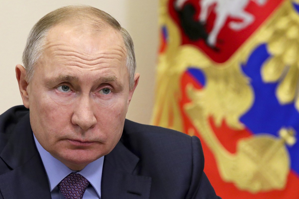 Russian President Vladimir Putin attends a cabinet meeting via video conference at the Novo-Ogaryovo residence outside Moscow, Russia, Thursday, Jan. 28, 2021. (Mikhail Klimentyev, Sputnik, Kremlin Po ...