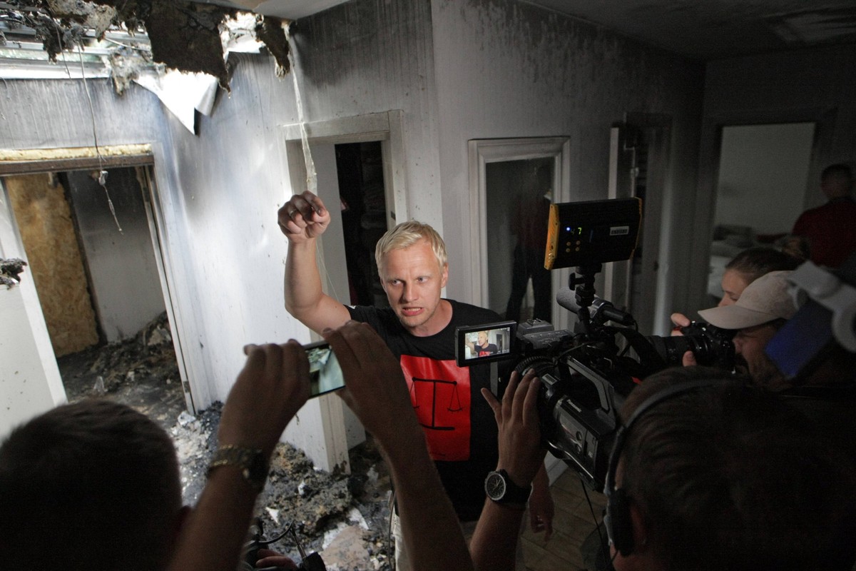 KYIV REGION, UKRAINE - JULY 23, 2020 - Chair of the Board, co-founder of the Anti-Corruption Action Centre AntAC Vitaliy Shabunin shows journalists around his fire-stricken house, Kyiv, capital of Ukr ...