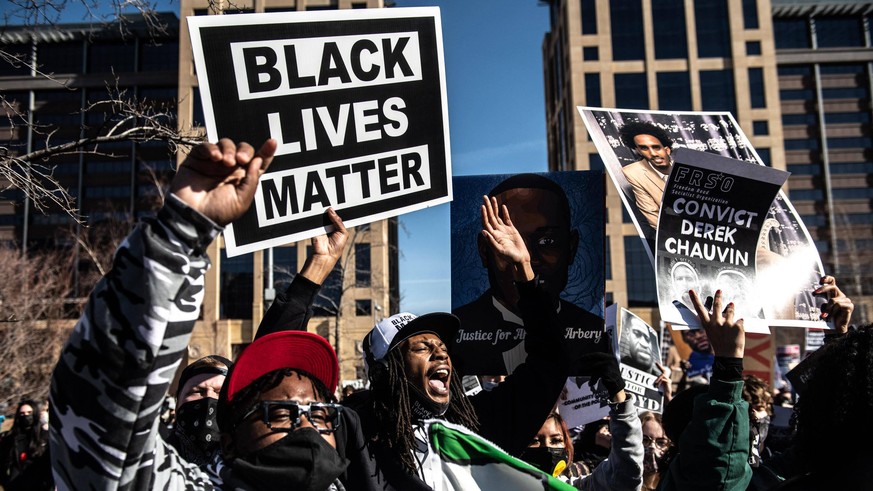 March 8, 2021, Minneapolis, Minnesota, USA: MINNEAPOLIS, MN - MARCH 08: General view of the protests during the civil rights march outside the Hennepin County Government Center on March 8, 2021 in Min ...