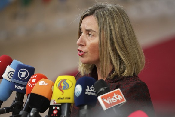 European Union foreign policy chief Federica Mogherini speaks with the media as she arrives for an EU summit at the Europa building in Brussels on Thursday, March 22, 2018. Leaders from the 28 Europea ...