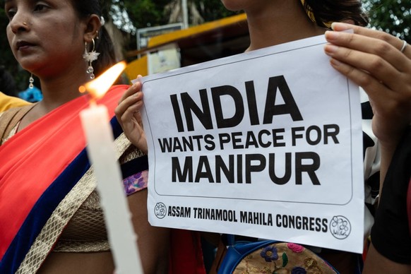 Activists candlelight protest over sexual assault case of two Kuki community women, during ongoing ethnic clashes between 
Meitei-Kuki community in Manipur, organised by Trinamool Mahila Congress, on  ...