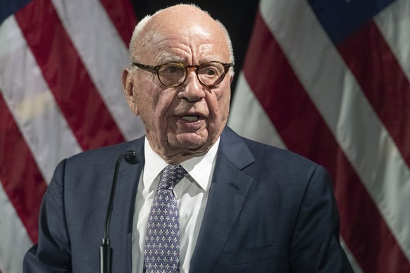 FILE - Rupert Murdoch introduces Secretary of State Mike Pompeo during the Herman Kahn Award Gala on Oct. 30, 2019, in New York. The Delaware judge overseeing Dominion Voting Systems' $1.6 billio ...