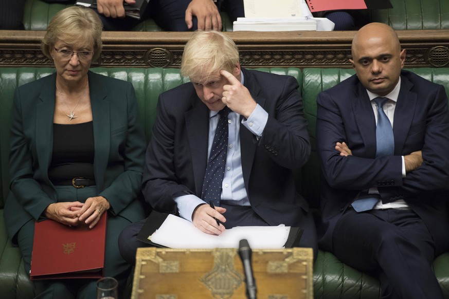 (190903) -- LONDON, Sept. 3, 2019 (Xinhua) -- British Prime Minister Boris Johnson (Front) gestures in the House of Commons in London, Britain, on Sept. 3, 2019. British Prime Minister Boris Johnson o ...