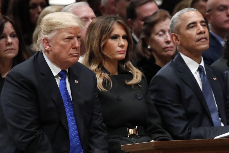 President Donald Trump, first lady Melania Trump and former President Barack Obama listen as former Canadian Prime Minister Brian Mulroney speaks during a State Funeral at the National Cathedral, Wedn ...